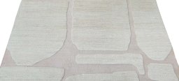Backside of handmade New Morocco rug showing knot structure and weave density