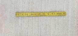 Full view of New Morocco rug from Pakistan, 245 × 175 cm in Beige tones