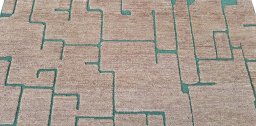 Backside of handmade New Morocco rug showing knot structure and weave density