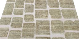 Backside of handmade New Morocco rug showing knot structure and weave density
