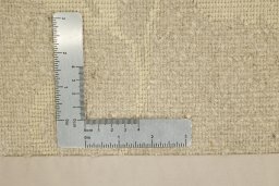 Corner detail of New Nepal Carpets rug showing border pattern and Wool pile