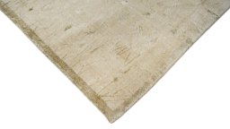 Backside of handmade New Nepal Carpets rug showing knot structure and weave density