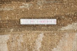 Full view of New Nepal Carpets rug from Nepal, 272 × 183 cm in Brown tones