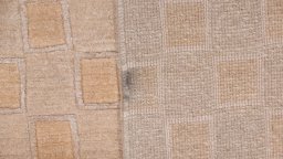 Corner detail of New Nepal Carpets rug showing border pattern and Wool pile