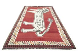 Close-up detail of 2000s Kilim Dastan rug from Iran / Persia showing Wool weave