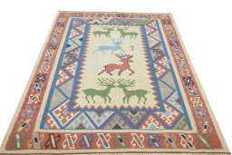 Close-up detail of 2000s Kilim Dastan rug from Iran / Persia showing Wool weave