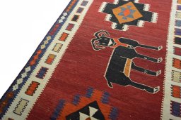 Surface texture of 2000s Kilim Dastan rug with natural Wool and intricate pattern