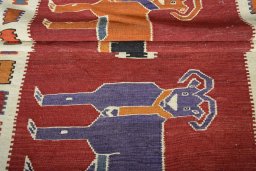 Close-up detail of 2000s Kilim Dastan rug from Iran / Persia showing Wool weave