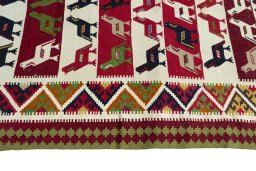 Close-up detail of New Kilim Dastan rug from Iran / Persia showing Wool weave