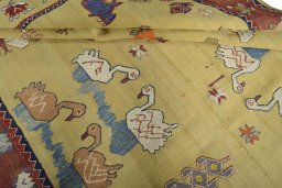 Full view of 1970s Kilim Dastan rug from Iran / Persia, 276 × 158 cm in Yellow tones