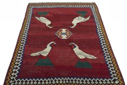 Close-up detail of 2000s Kilim Dastan rug from Iran / Persia showing Wool weave