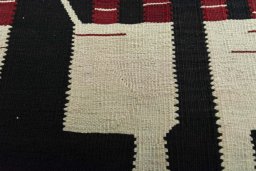 Backside of handmade New Kilim Dastan rug showing knot structure and weave density