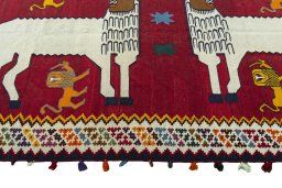 Close-up detail of 2000s Kilim Dastan rug from Iran / Persia showing Wool weave