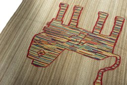 Surface texture of 2000s Kilim Dastan rug with natural Wool and intricate pattern