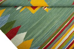 Close-up detail of New Kilim Dastan rug from Iran / Persia showing Wool weave
