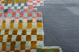 Backside of handmade New Kilim Dastan rug showing knot structure and weave density