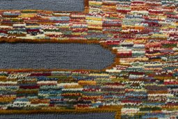 Backside of handmade New Kilim Dastan rug showing knot structure and weave density