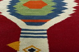 Backside of handmade New Kilim Dastan rug showing knot structure and weave density