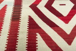 Backside of handmade New Kilim Dastan rug showing knot structure and weave density
