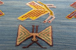 Backside of handmade New Kilim Dastan rug showing knot structure and weave density
