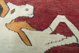 Backside of handmade New Kilim Jajim rug showing knot structure and weave density
