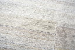Backside of handmade New Kilim Kiasar rug showing knot structure and weave density