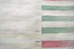 Backside of handmade New Kilim Kiasar rug showing knot structure and weave density