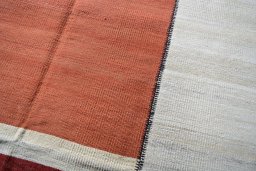 Backside of handmade New Kilim Kiasar rug showing knot structure and weave density