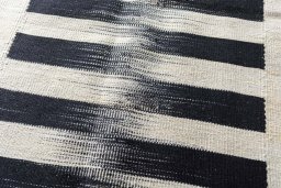 Backside of handmade New Kilim Kiasar rug showing knot structure and weave density