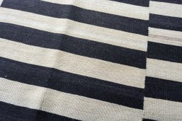 Backside of handmade New Kilim Kiasar rug showing knot structure and weave density