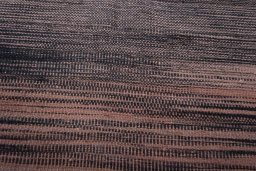 Backside of handmade New Kilim Kiasar rug showing knot structure and weave density