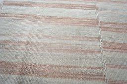 Backside of handmade New Kilim Kiasar rug showing knot structure and weave density