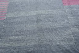Backside of handmade New Kilim Kiasar rug showing knot structure and weave density