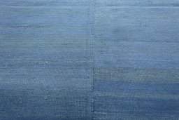 Backside of handmade New Kilim Kiasar rug showing knot structure and weave density