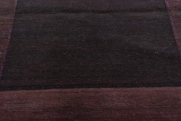 Backside of handmade New Kilim Kiasar rug showing knot structure and weave density