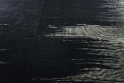 Backside of handmade New Kilim Kiasar rug showing knot structure and weave density