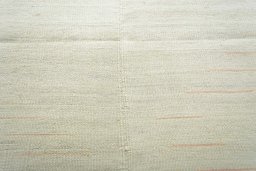 Backside of handmade New Kilim Kiasar rug showing knot structure and weave density