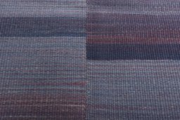 Backside of handmade New Kilim Kiasar rug showing knot structure and weave density