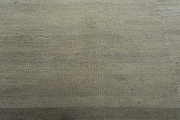 Backside of handmade New Kilim Kiasar rug showing knot structure and weave density