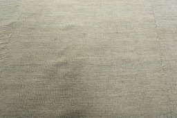 Backside of handmade New Kilim Kiasar rug showing knot structure and weave density