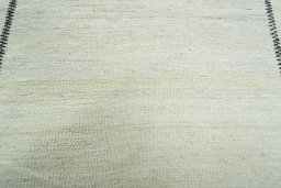 Backside of handmade New Kilim Kiasar rug showing knot structure and weave density