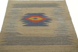 Close-up detail of New Kilim Sofre rug from Iran / Persia showing Wool weave