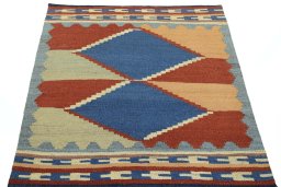 Close-up detail of New Kilim Sofre rug from Iran / Persia showing Wool weave