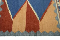 Close-up detail of New Kilim Sofre rug from Iran / Persia showing Wool weave