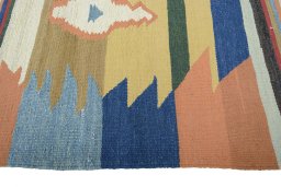 Close-up detail of New Kilim Sofre rug from Iran / Persia showing Wool weave