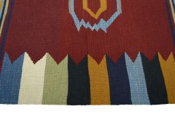 Close-up detail of New Kilim Sofre rug from Iran / Persia showing Wool weave
