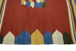 Close-up detail of New Kilim Sofre rug from Iran / Persia showing Wool weave