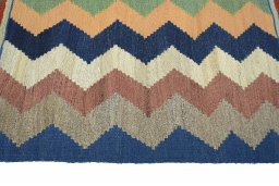 Close-up detail of New Kilim Sofre rug from Iran / Persia showing Wool weave