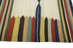 Close-up detail of New Kilim Sofre rug from Iran / Persia showing Wool weave