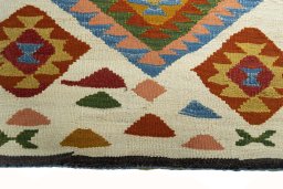 Central medallion detail of New Kilim Sofre rug from Iran / Persia